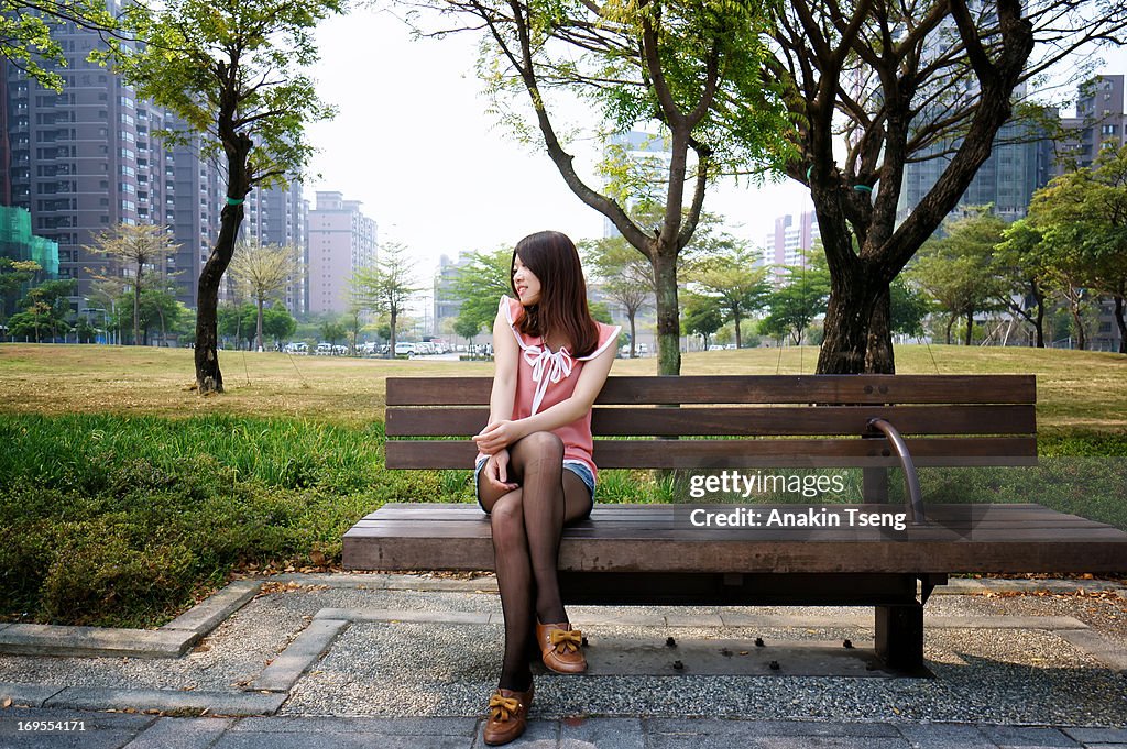 Girl sitting on the bench