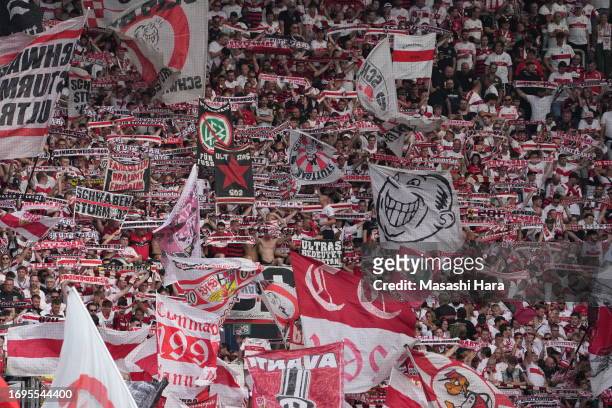 Supporters of Stuttgart cheer during the Bundesliga match between 1. FSV Mainz 05 and VfB Stuttgart at MEWA Arena on September 16, 2023 in Mainz,...