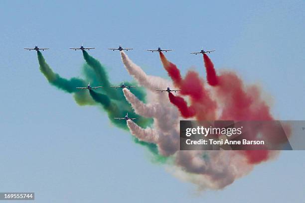 The Frecce Tricolori demonstration flight during the 60th Anniversary Celebration of The "Patrouille de France", the legendary French flight...