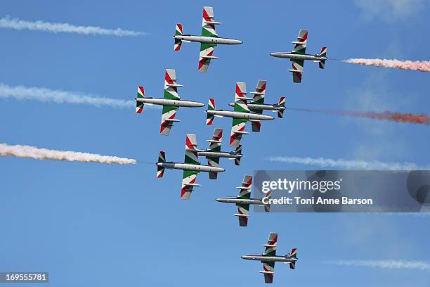 The Frecce Tricolori demonstration flight during the 60th Anniversary Celebration of The "Patrouille de France", the legendary French flight...