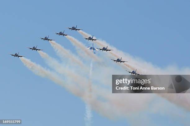 The Frecce Tricolori demonstration flight during the 60th Anniversary Celebration of The "Patrouille de France", the legendary French flight...