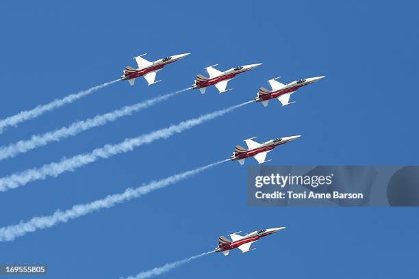 La Patrouille Suisse" - The Swiss Patrol demonstration flight during the 60th Anniversary Celebration of The "Patrouille de France", the legendary...