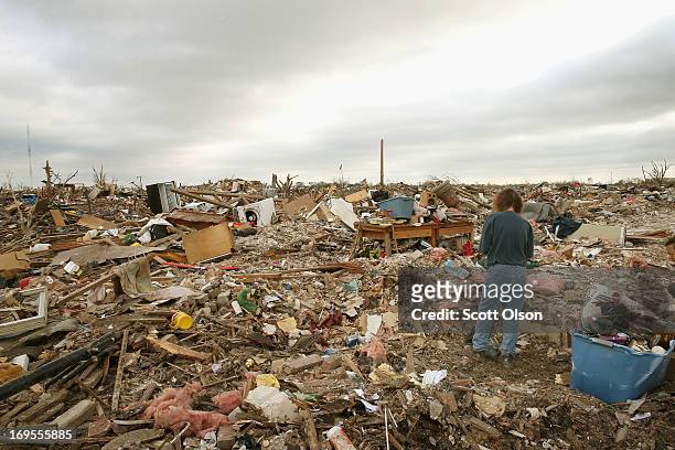 Carol Kawaykla arrives at her home to find a bulldozer had cleared the foundation of rubble on May 27, 2013 in Moore, Oklahoma. Kawaykla, who has...