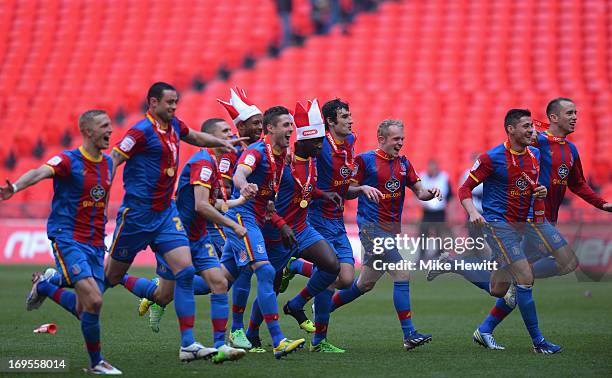 The Crystal Palace players celebrate following their victory in extra-time during the npower Championship Play-off Final match between Watford and...