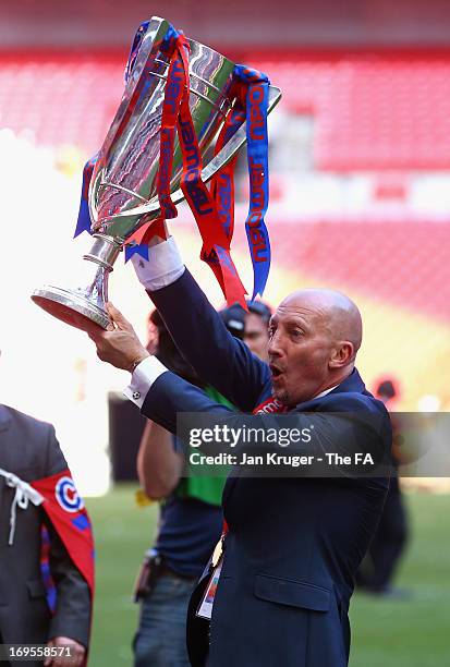 Crystal Palace Manager Ian Holloway celebrates his team's promotion with the trophy at the end of the npower Championship Play-off Final match...