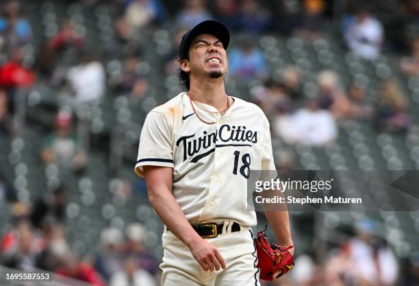 Kenta Maeda of the Minnesota Twins reacts after walking a batter in the sixth inning of the game against the Oakland Athletics at Target Field on...