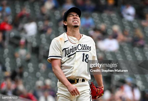 Kenta Maeda of the Minnesota Twins reacts after walking a batter in the sixth inning of the game against the Oakland Athletics at Target Field on...