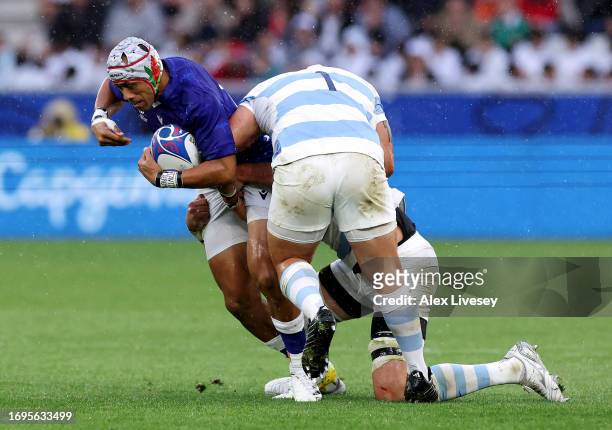 Christian Leali'ifano of Samoa is tackled by Thomas Gallo of Argentina during the Rugby World Cup France 2023 match between Argentina and Samoa at...