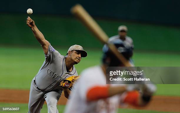 Jhoulys Chacin of the Colorado Rockies throws a pitch during the fourth inning to J.D. Martinez of the Houston Astros at Minute Maid Park on May 27,...