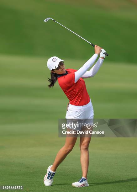 Rose Zhang of The United States Team plays her second shot on the ninth hole in her match with Megan Khang against Gemma Dryburgh and Madelene...