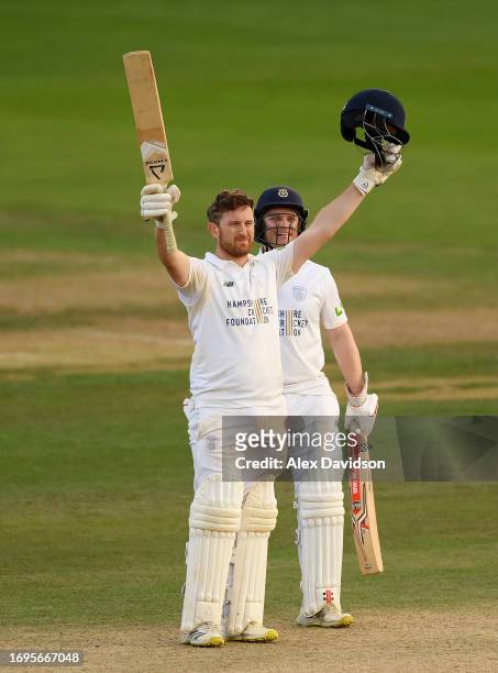 Liam Dawson of Hampshire celebrates reaching his century alongside Ben Brown during Day Four of the LV= Insurance County Championship Division 1...