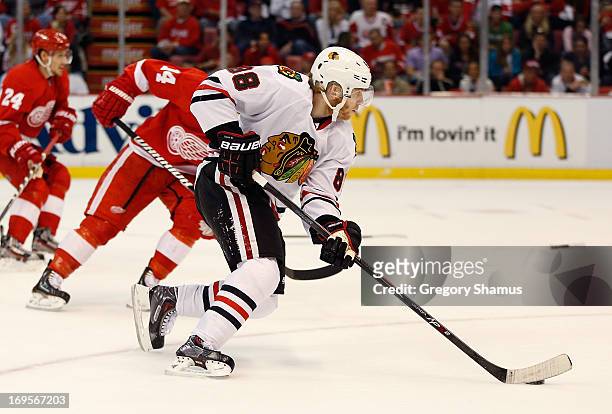 Patrick Kane of the Chicago Blackhawks drives to the net past Gustav Nyquist of the Detroit Red Wings during the first period in Game Six of the...