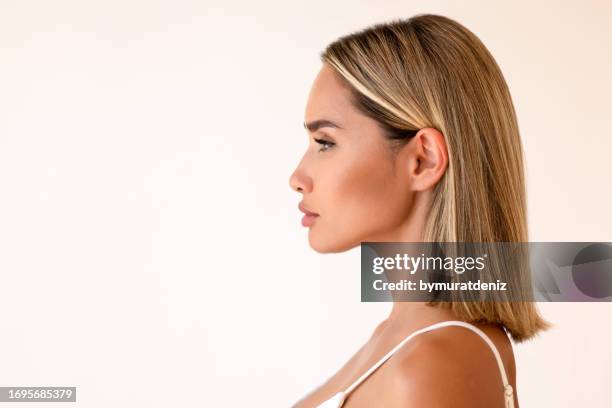 side profile of woman - beautiful woman profile stock pictures, royalty-free photos & images