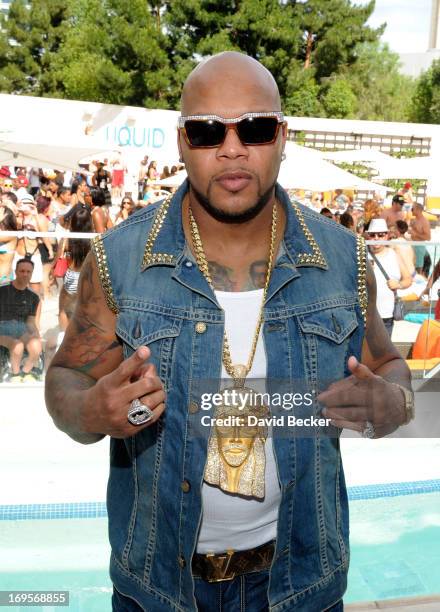 Recording artist Flo Rida appears at the Liquid Pool Lounge at the Aria Resort & Casino at CityCenter on May 27, 2013 in Las Vegas, Nevada.