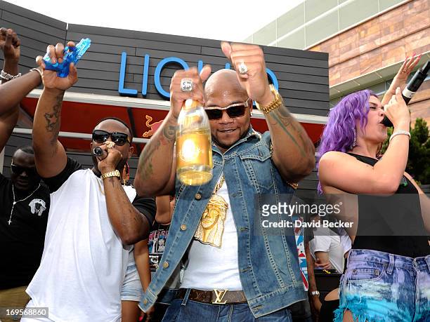 Recording artist Flo Rida performs at the Liquid Pool Lounge at the Aria Resort & Casino at CityCenter on May 27, 2013 in Las Vegas, Nevada.