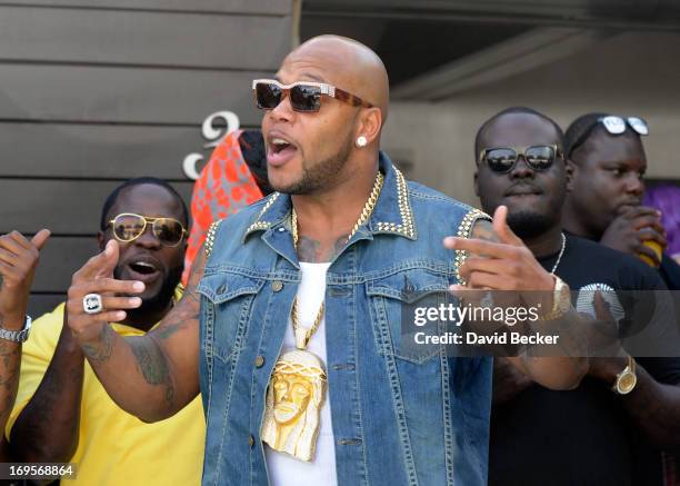 Recording artist Flo Rida appears at the Liquid Pool Lounge at the Aria Resort & Casino at CityCenter on May 27, 2013 in Las Vegas, Nevada.