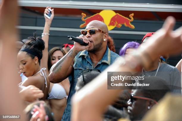 Recording artist Flo Rida performs at the Liquid Pool Lounge at the Aria Resort & Casino at CityCenter on May 27, 2013 in Las Vegas, Nevada.