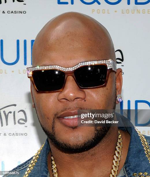 Recording artist Flo Rida arrives at the Liquid Pool Lounge at the Aria Resort & Casino at CityCenter on May 27, 2013 in Las Vegas, Nevada.