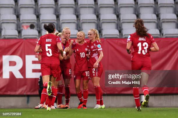 Amalie Vangsgaard of Denmark celebrates with teammates after scoring the team's second goal during the UEFA Women's Nations League match between...