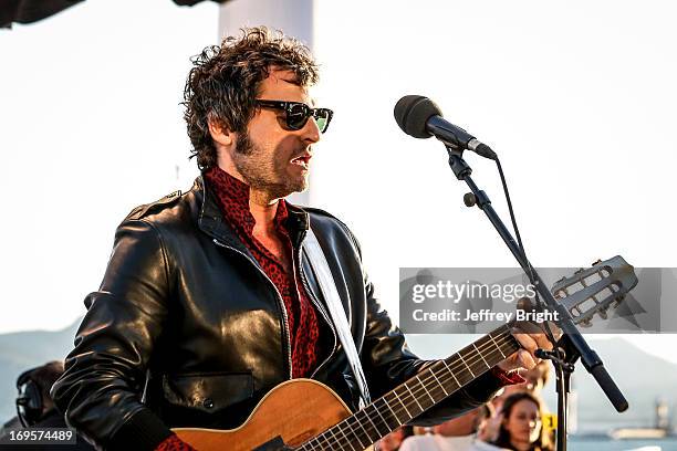 Performs on stage at 'Le Grand Journal' TV show at the 66th Annual Cannes Film Festival on May 20, 2013 in Cannes, France.