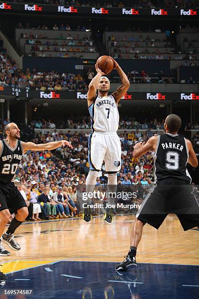 Jerryd Bayless of the Memphis Grizzlies goes for a jump shot against Tony Parker of the San Antonio Spurs in Game Four of the Western Conference...