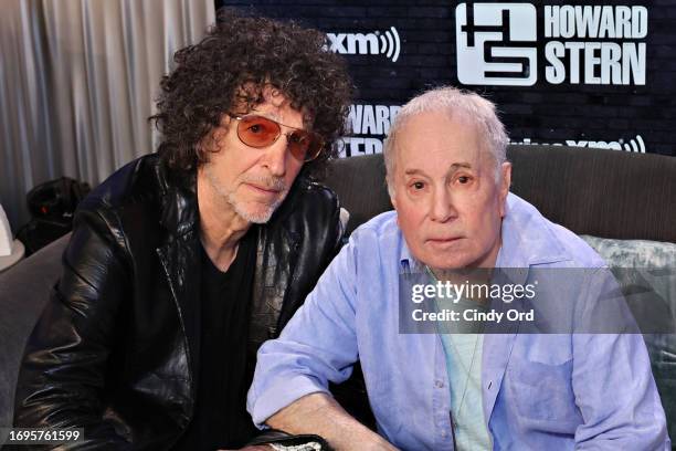 Howard Stern and Paul Simon pose for a photo during SiriusXM's 'The Howard Stern Show' at SiriusXM Studios on September 20, 2023 in New York City.