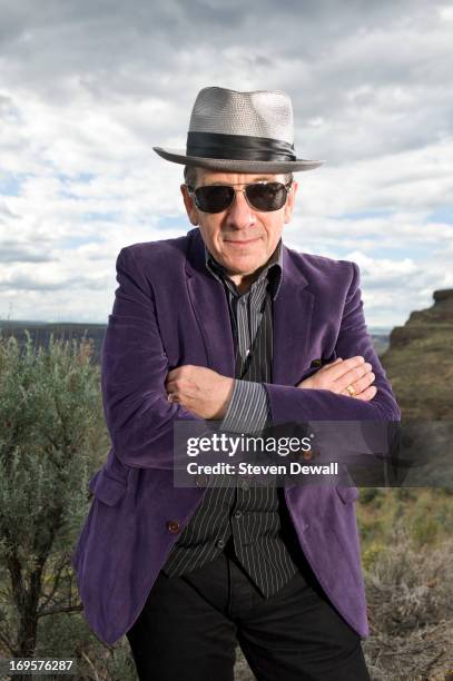 Elvis Costello poses for a portrait backstage at the Gorge Amphitheater on May 26, 2013 in Quincy, Washington.