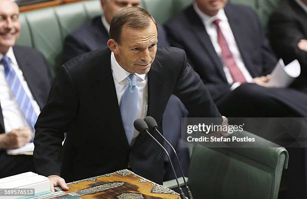 Opposition Leader Tony Abbott smiles during House of Representatives question time on May 28, 2013 in Canberra, Australia. Prime Minister Gillard...