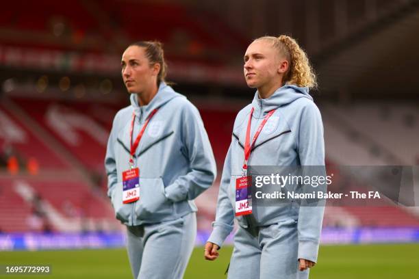 Lucy Parker and Katie Robinson of England look on prior to the UEFA Women's Nations League match between England and Scotland at Stadium of Light on...