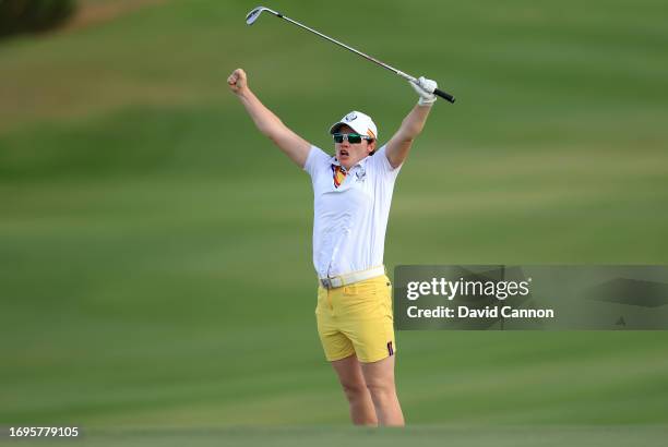 Leona Maguire of The European Team celebrates holing her fourth shot on the 18th hole for a match winning birdie in her match with Georgia Hall...