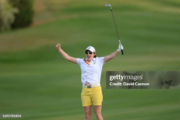 Leona Maguire of The European Team celebrates holing her fourth shot on the 18th hole for a match winning birdie in her match with Georgia Hall...