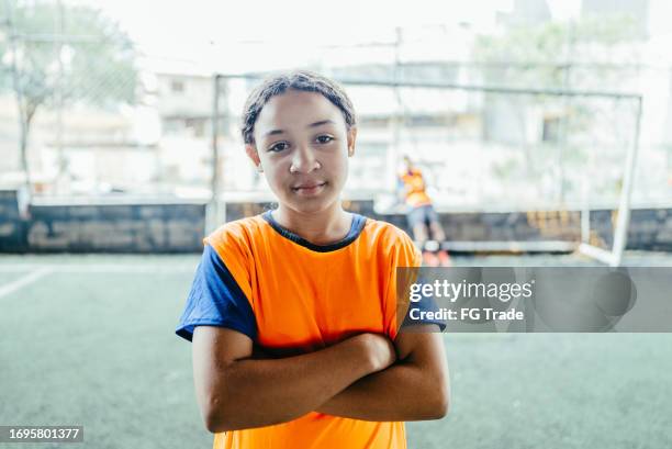 portrait of a soccer girl player on the soccer field - sunday league stock pictures, royalty-free photos & images