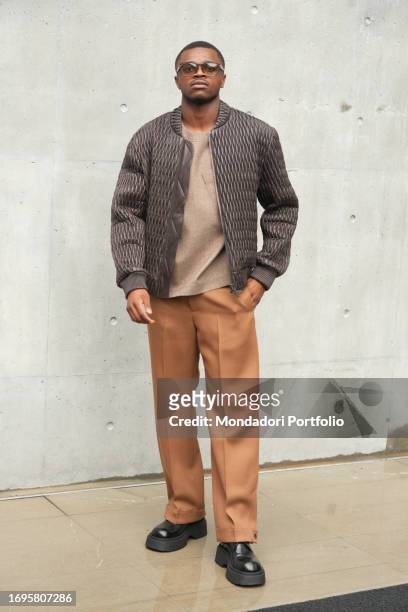 Milan's Portuguese footballer Rafael Leao guest at the Emporio Armani fashion show. Milan Fashion Week Women's Collection SS 2024. Milan , September...