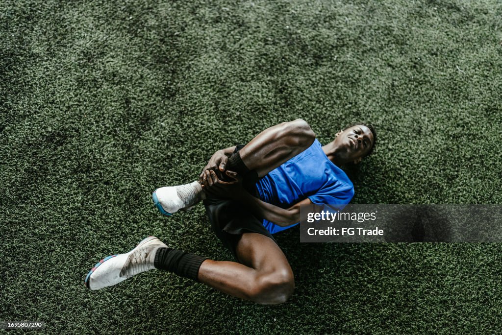 Injured soccer player on a soccer field