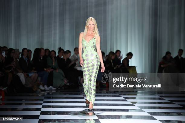 Claudia Schiffer walks the runway at the Versace fashion show during the Milan Fashion Week Womenswear Spring/Summer 2024 on September 22, 2023 in...