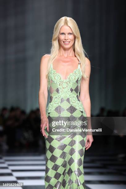 Claudia Schiffer walks the runway at the Versace fashion show during the Milan Fashion Week Womenswear Spring/Summer 2024 on September 22, 2023 in...