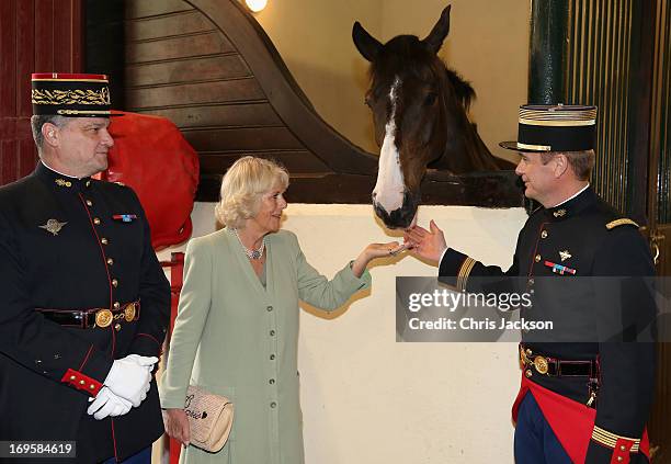 Camilla, Duchess of Cornwall visits the stables at the French Republican Guard headquarters on May 28, 2013 in Paris France. Camilla is on her first...