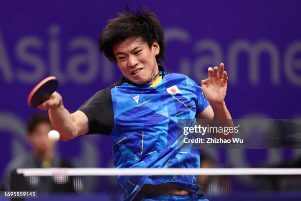 Togami Shunsuke of Japan in action against Shrestha Bilash of Nepal during the 19th Asian Games Table Tennis Men's Team Preliminary -Group B between...