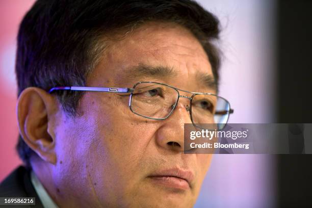 He Guangbei, chief executive officer of BOC Hong Kong Ltd., attends a news conference following the company's annual general meeting in Hong Kong,...