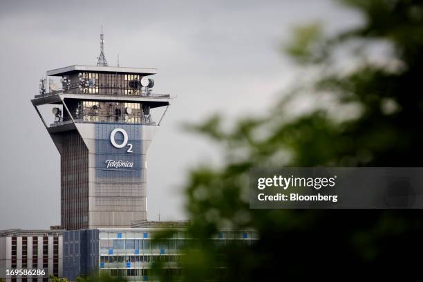 An O2 logo sits on display on the digital transmission tower at the Telefonica Czech Republic AS offices in Prague, Czech Republic, on Monday, May...