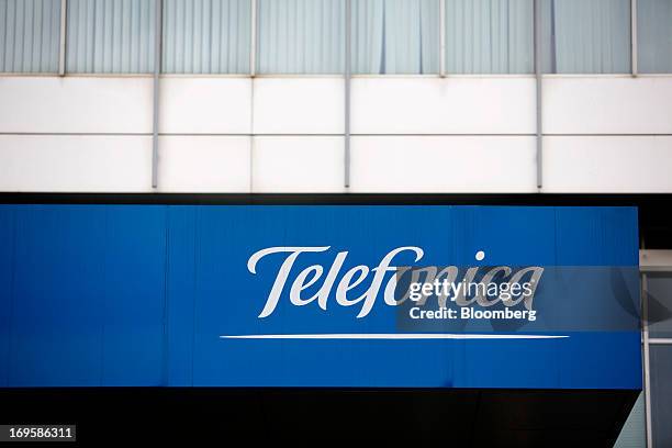 Logo sits on display outside the entrance to the Telefonica Czech Republic AS offices in Prague, Czech Republic, on Monday, May 27, 2013. Czech...