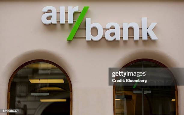 Logo sits on display outside an Air Bank branch in Prague, Czech Republic, on Monday, May 27, 2013. Czech policy makers are in uncharted territory as...