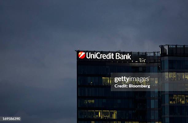 The offices of UniCredit Bank Czech Republic SA stand illuminated at night in Prague, Czech Republic, on Monday, May 27, 2013. Czech policy makers...