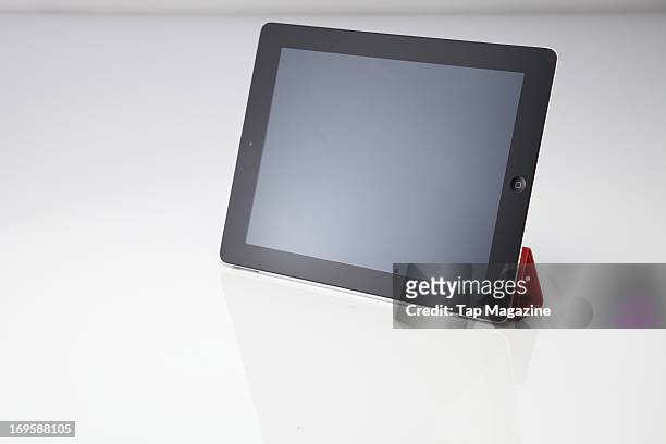 An Apple iPad 2 tablet computer with attached Smart Cover photographed during a studio shoot for Tap Magazine, October 31, 2012.