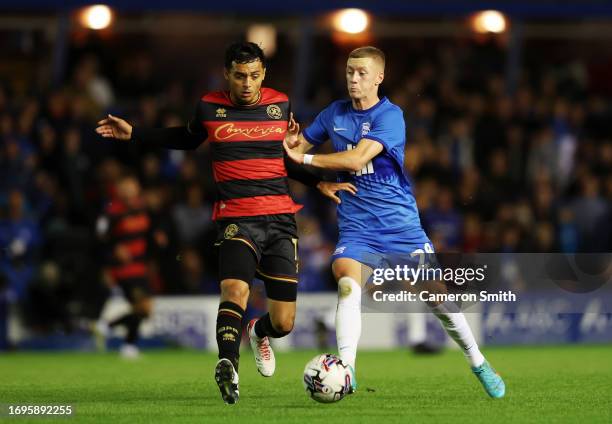 Andre Dozzell of Queens Park Rangers is challenged by Jay Stansfield of Birmingham City during the Sky Bet Championship match between Birmingham City...