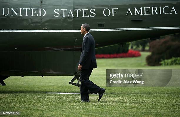 President Barack Obama walks on the South Lawn of the White House prior to his departure for New Jersey May 28, 2013 in Washington, DC. President...