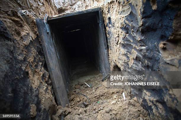 The entrance to a 45m long tunnel built for a bank robbery into a branch of the Berliner Volksbank in January 2013 is pictured on May 28, 2013 in...