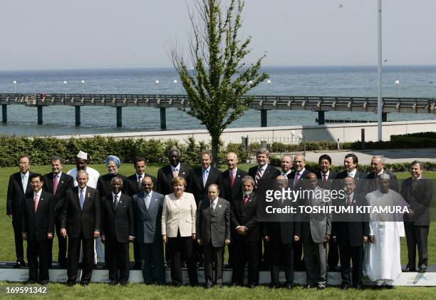 Heads of State, representatives of the top five developing nations and leaders of African countries pose for a family picture 08 June 2007 in...