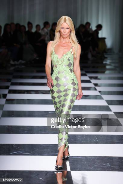 Claudia Schiffer walks the runway at the Versace fashion show during the Milan Fashion Week Womenswear Spring/Summer 2024 on September 22, 2023 in...