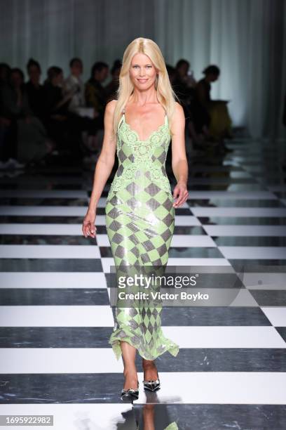 Claudia Schiffer walks the runway at the Versace fashion show during the Milan Fashion Week Womenswear Spring/Summer 2024 on September 22, 2023 in...